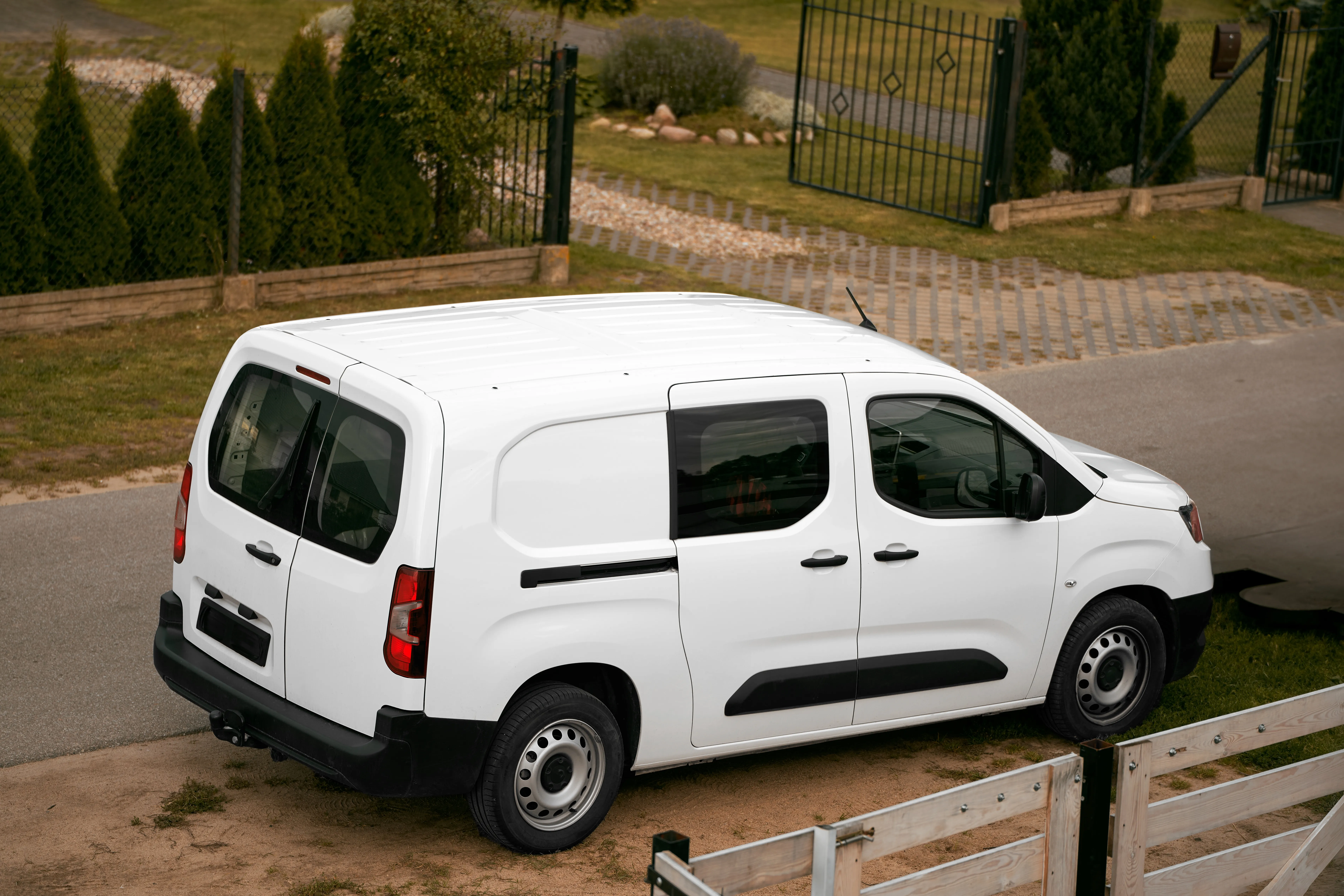 White compact delivery van for small parcels and documents